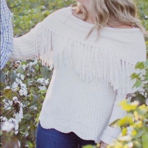 White sweater worn once for pictures. Size medium